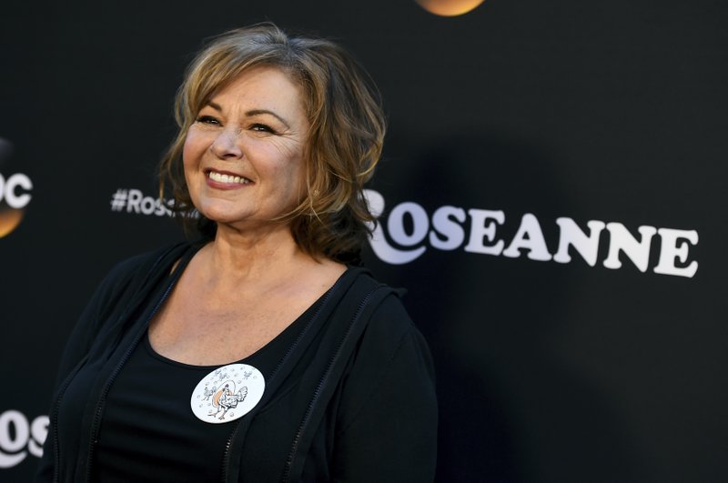 FILE - In this March 23, 2018, file photo, Roseanne Barr arrives at the Los Angeles premiere of "Roseanne" on Friday in Burbank, Calif. Barr has apologized for suggesting that former White House adviser Valerie Jarrett is a product of the Muslim Brotherhood and the "Planet of the Apes." Barr on Tuesday, May 29, tweeted that she was sorry to Jarrett "for making a bad joke about her politics and her looks." Jarrett, who is African-American, advised Barack and Michelle Obama. (Photo by Jordan Strauss/Invision/AP, File)