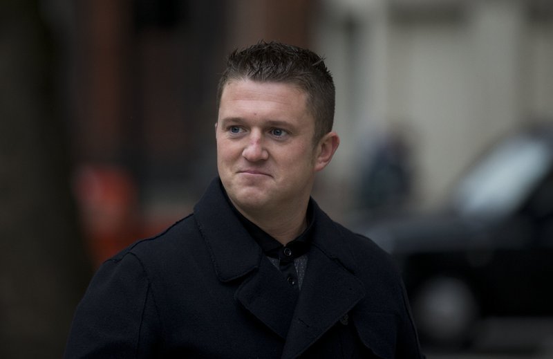 FILE - In this Wednesday, Oct. 16, 2013 file photo, Tommy Robinson the former leader of the far-right EDL "English Defence League" group arrives for an appearance at Westminster Magistrates Court in London.  (AP Photo/Matt Dunham, File)
