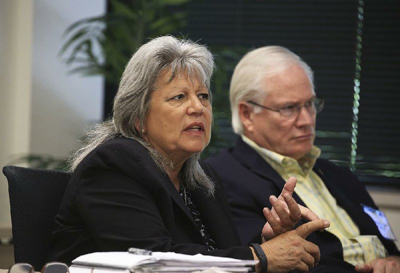 Cheryl May (left), chairman of the Arkansas School Safety Commission, sits Wednesday with Vice Chairman Bill Temple during the panel’s meeting in Little Rock. May is director of the Criminal Justice Institute, a part of the University of Arkansas System. Temple is a retired FBI agent who once ran the Little Rock office.  
