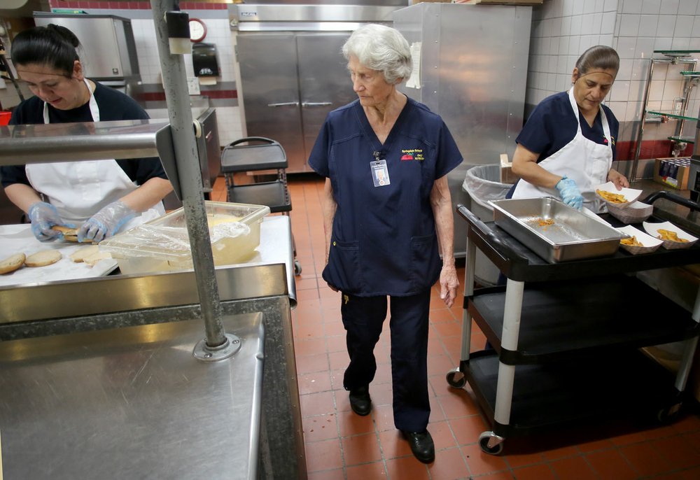 Cafeteria manager cleans plate after 58 years