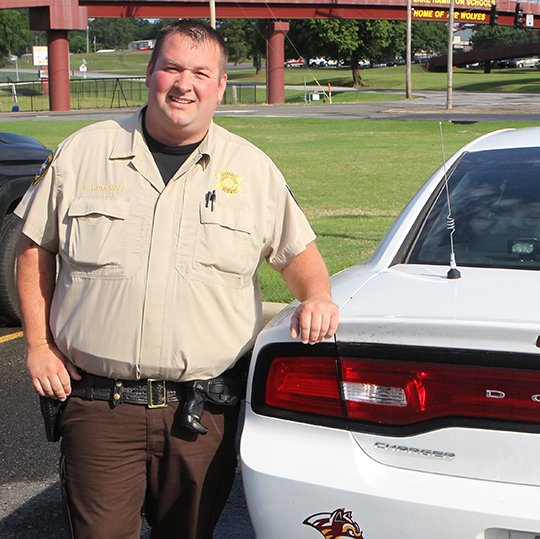 The Sentinel-Record/Richard Rasmussen ON DUTY: Garland County sheriff's Deputy Richard Huffman has been named Lake Hamilton School District's first school resource officer. Huffman will begin work with the district in August.