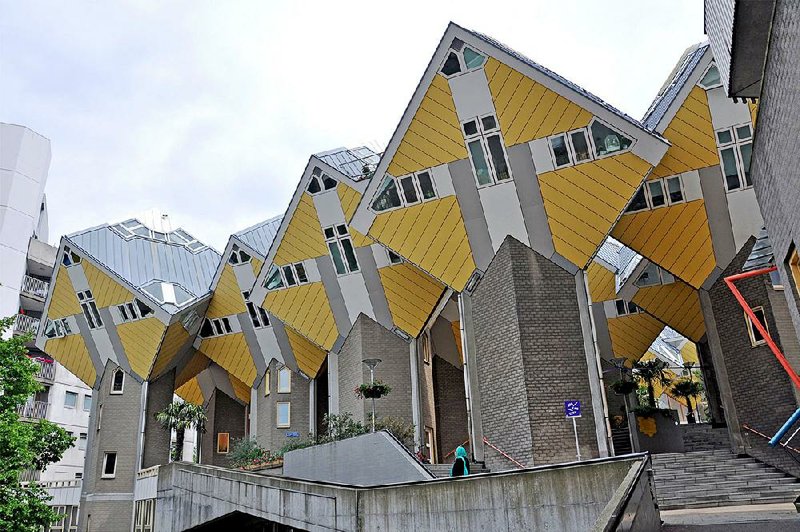 Rotterdam’s Cube Houses are emblematic of postwar architecture — 39 tilted yellow cubes, each a single-family house.  