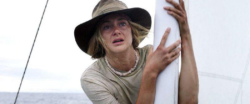 Tami (Shailene Woodley) sails directly into a fierce hurricane in Baltasar Kormakur’s fact-based aquatic action film Adrift. 

