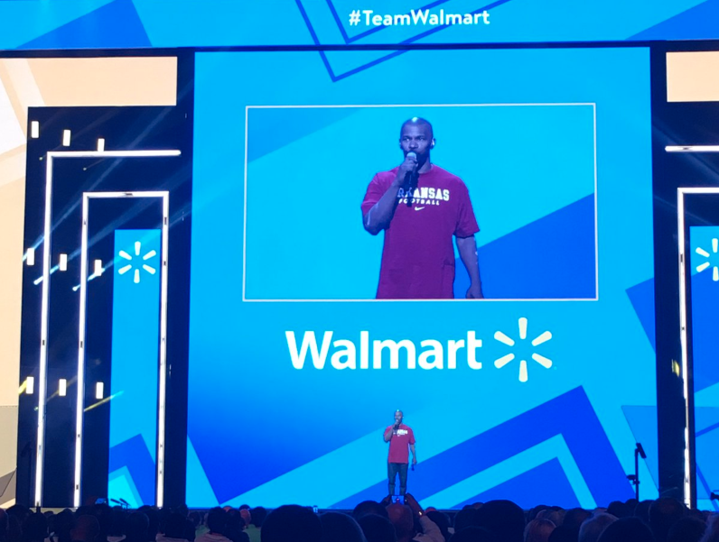 Jamie Foxx wears an Arkansas football shirt during the Walmart shareholders meeting on Friday.