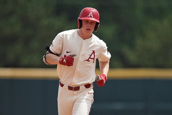 Arkansas outfielder Heston Kjerstad rounds the bases after hitting a home run during the third inning of an NCAA Tournament game against Oral Roberts on Friday, June 1, 2018, in Fayetteville. 
