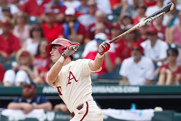 Arkansas second baseman Carson Shaddy hits a home run during the sixth inning of an NCAA Tournament game against Oral Roberts on Friday, June 1, 2018, in Fayetteville.