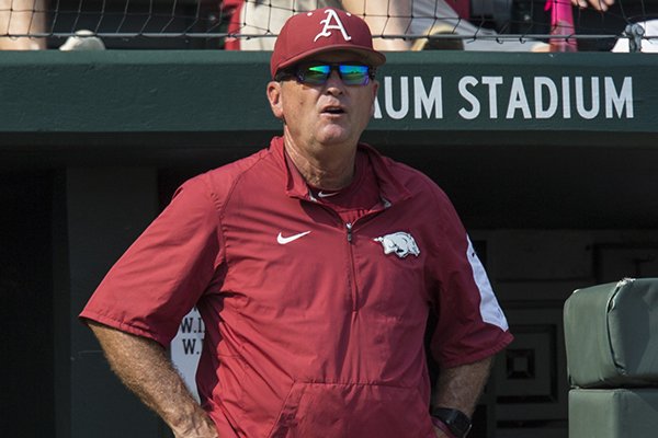 Arkansas coach Dave Van Horn watches from the dugout during an NCAA Tournament game against Oral Roberts on Friday, June 1, 2018, in Fayetteville. 