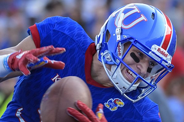 Kansas Jayhawks wide receiver Chase Harrell (3) pulls in a touchdown pass one-handed during the first half of an NCAA college football game in Lawrence, Kan., Saturday, Sept. 2, 2017. (AP Photo/Reed Hoffmann)