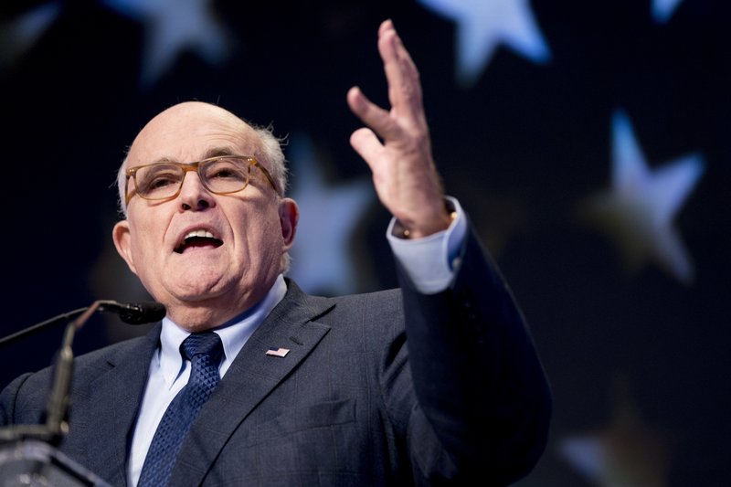 FILE- In this May 5, 2018, file photo, Rudy Giuliani, an attorney for President Donald Trump, speaks at the Iran Freedom Convention for Human Rights and democracy in Washington.  (AP Photo/Andrew Harnik, File)