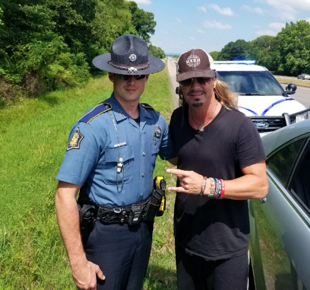 Trooper Deston Linkous with Poison's Bret Michaels. 