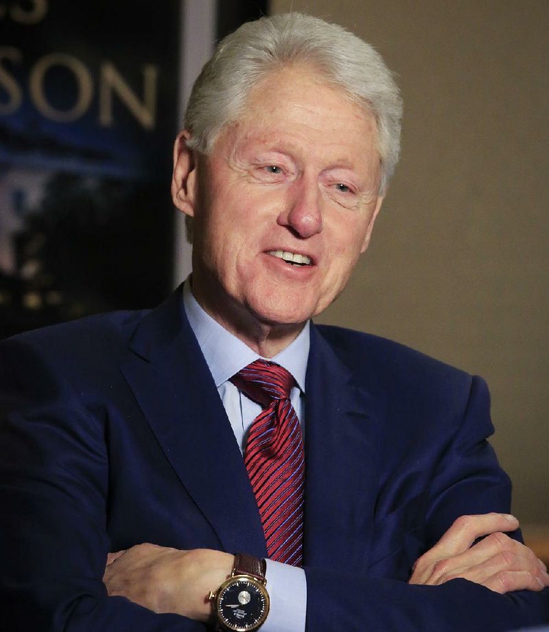 In this Monday, May 21, 2018, photo, former President Bill Clinton listens during an interview about a novel he wrote with James Patterson, "The President is Missing,"  in New York. 