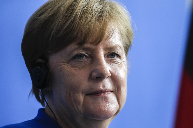 German Chancellor Angela Merkel attends a news conference with Israeli Prime Minister Benjamin Netanyahu after a meeting at the chancellery in Berlin, Monday, June 4, 2018. (AP Photo/Markus Schreiber)