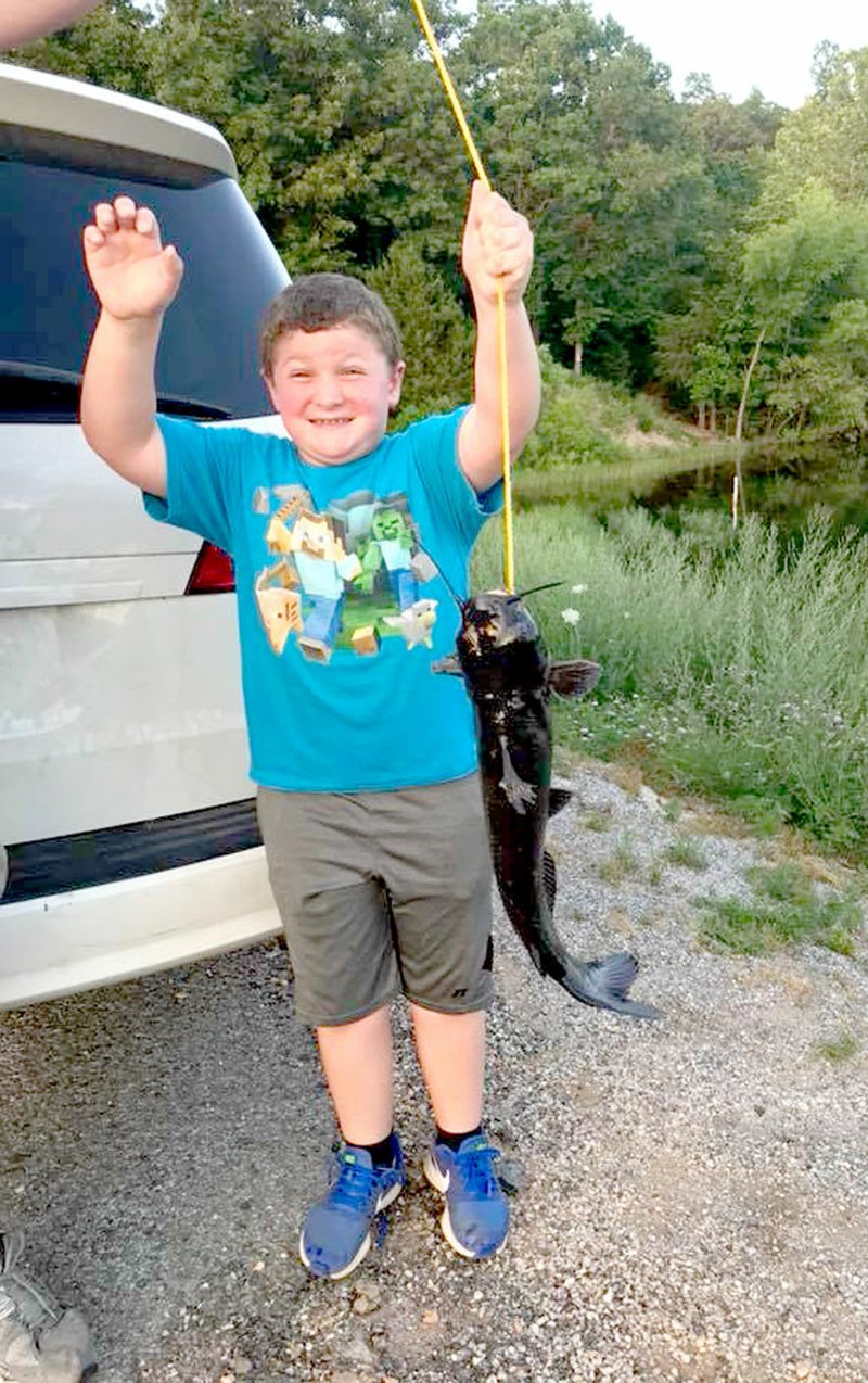 Seven-year-old Carter Musteen's first catch was also his second catch. He was fishing for trout at Lake Brittany when he caught this catfish -- twice.