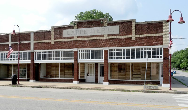 Westside Eagle Observer/RANDY MOLL The Carpenter Building at 136 East Main Street in Gentry was built in 1927 from a Craftsman-style design by architect A.O. Clarke. The building was added to the National Register of Historic Places.