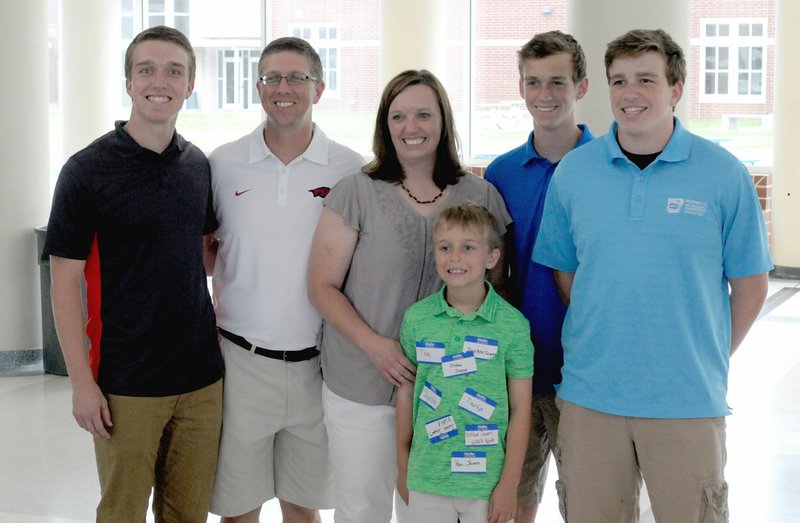MARK HUMPHREY ENTERPRISE-LEADER Javan Jowers (left), a 2018 Farmington graduate, posses with his family, Nathan Jowers, dad; Pam Jowers, mother; and brothers, Jaxton, Jared and Josh, during a sendoff for service academy appointees hosted by Congressman Steve Womack, of Rogers, on Saturday at Har-Ber High School in Springdale. Javan will attend the U.S. Air Force Academy, at Colorado Springs, Colo.