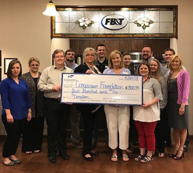 Farmers Bank & Trust donates parade winnings Magnolia Banner News