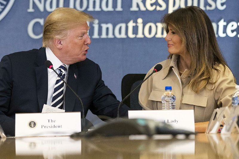 Melania Trump attends a briefing with her husband Wednesday in Washington.  
