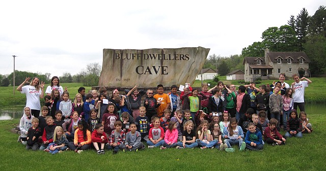 Photo Submitted Anderson Elementary second-grade students and teachers enjoyed a beautiful day filled with science concepts, history lessons and a picnic lunch on their trip to the Bluff Dwellers Cave.