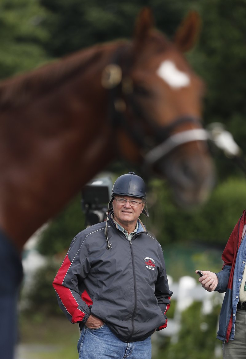 The Associated Press UPSET BID: Trainer Bill Mott watches as Belmont Stakes hopeful Hofburg is bathed after a workout at Belmont Park Wednesday in Elmont, N.Y., is one of 10 horses racing in the 150th running of the Belmont Stakes horse race on Saturday.