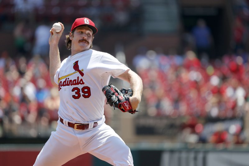 St. Louis Cardinals starting pitcher Miles Mikolas throws during the first inning of a baseball game against the Miami Marlins Thursday, June 7, 2018, in St. Louis. (AP Photo/Jeff Roberson)