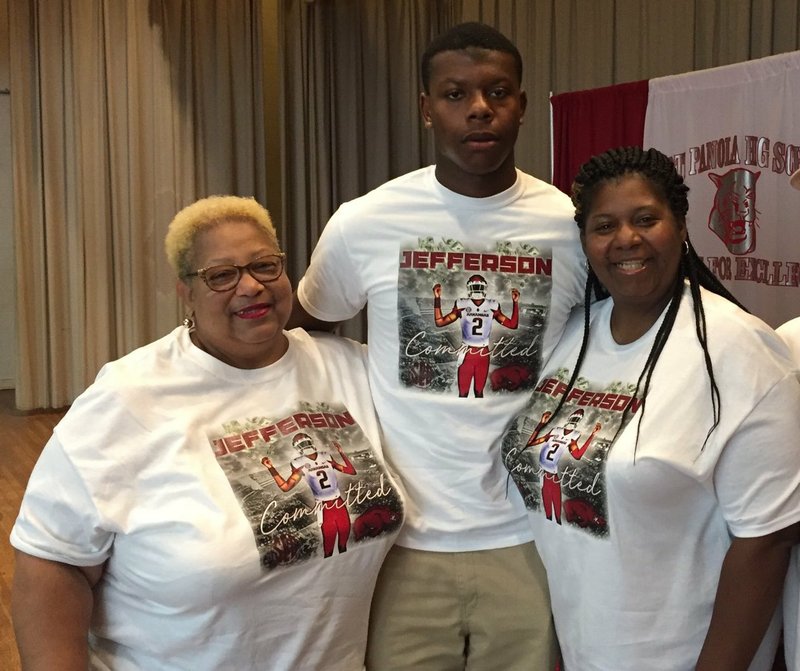 Arkansas QB commit KJ Jefferson pose with his grandmother (left) and mother after announcing for the Razorbacks on May 18. 