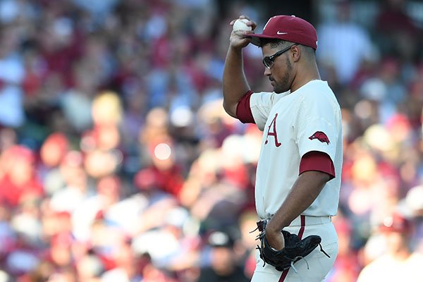 Arkansas pitcher Isaiah Campbell reacts after loading the bases during an NCAA Tournament game against Dallas Baptist on Sunday, June 3, 2018, in Fayetteville. 