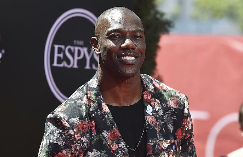 Terrell Owens said Thursday that he will not attend the induction ceremony for the Pro Football Hall of Fame in August, an unprecedented decision by an inductee. 