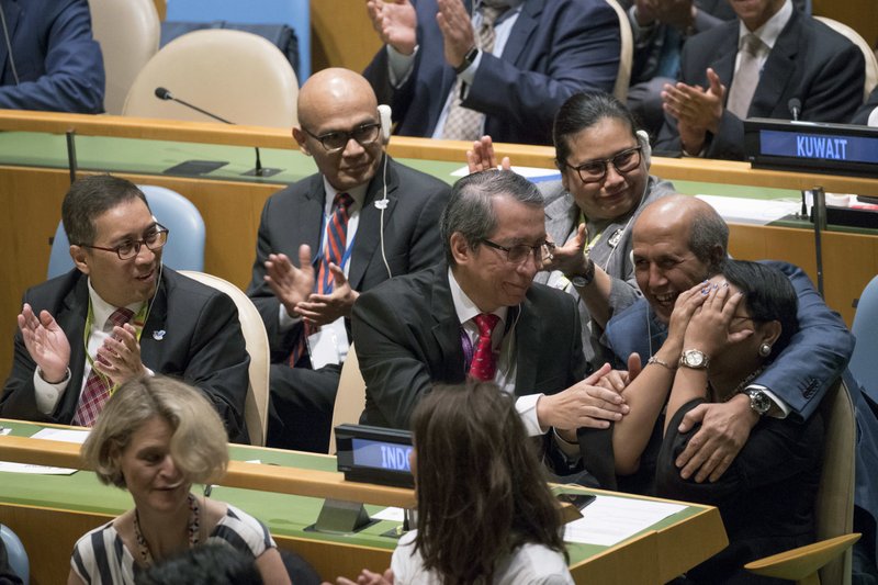 The Indonesian delegation reacts after being voted in during the election of five non-permanent members of the Security Council, Friday, June 8, 2018 at United Nations headquarters. (AP Photo/Mary Altaffer)