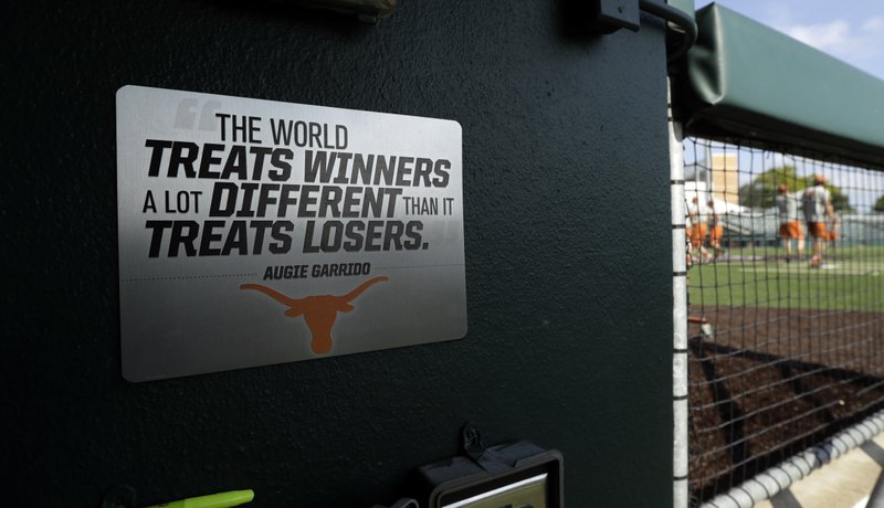 In this Wednesday, June 6, 2018, photo,  long-time Texas head baseball coach Augie Garrido is seen is the dugout, in Austin, Texas. 