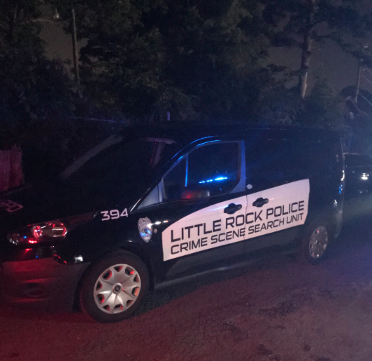 A police vehicle is parked at the scene of a homicide on Stanton Road in this photograph posted on Twitter by the Little Rock Police Department.