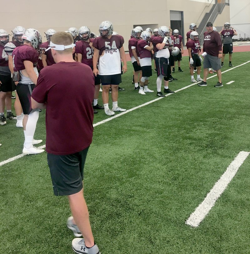 Photo submitted Members of the Siloam Springs football team prepare to warm up for practice at Pittsburg State (Kan.) Team Camp last week.