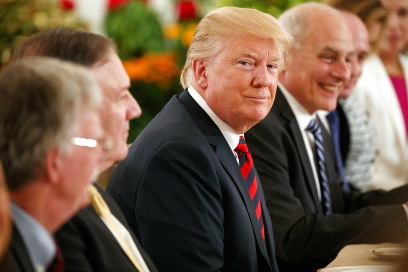 President Donald Trump listens during a meeting with Singapore Prime Minister Lee Hsien Loong ahead of a summit with North Korean leader Kim Jong Un, Monday, June 11, 2018, in Singapore. (AP Photo/Evan Vucci)