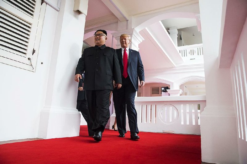 President Donald Trump and Kim Jong Un of North Korea head to a private, one-on-one meeting in Singapore.  