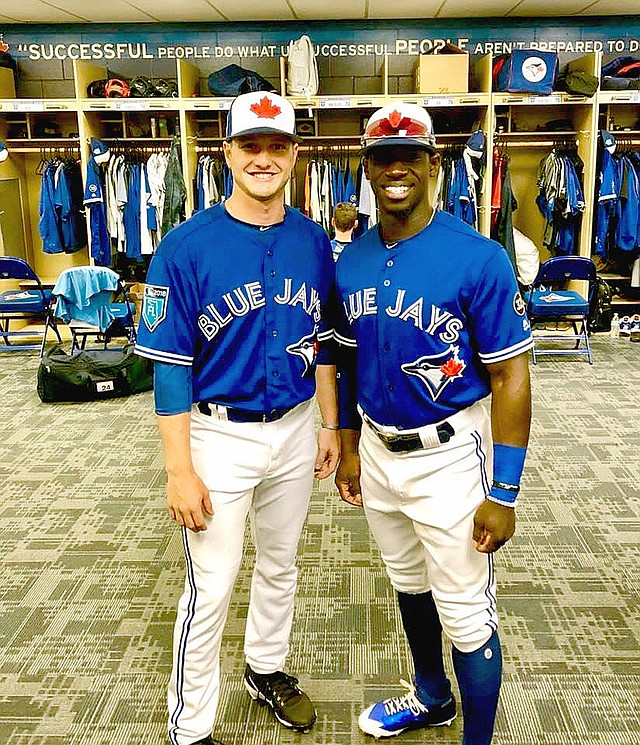 Submitted photo Prairie Grove 2014 graduate Ty Tice (left) poses with fellow UCA alumni Jonathan Davis during spring training when both were temporarily assigned to the Toronto Blue Jays. Tice was selected in the 16th round of the 2017 MLB draft. Davis is a Camden native, who was drafted in the 15th round in the 2013 First-Year Player draft.