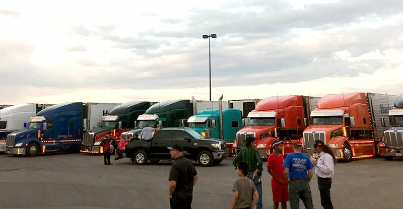 Stephanie Freeman/Special to the Herald-Leader Riders and drivers converse in a parking lot in Albuquerque, N.M.