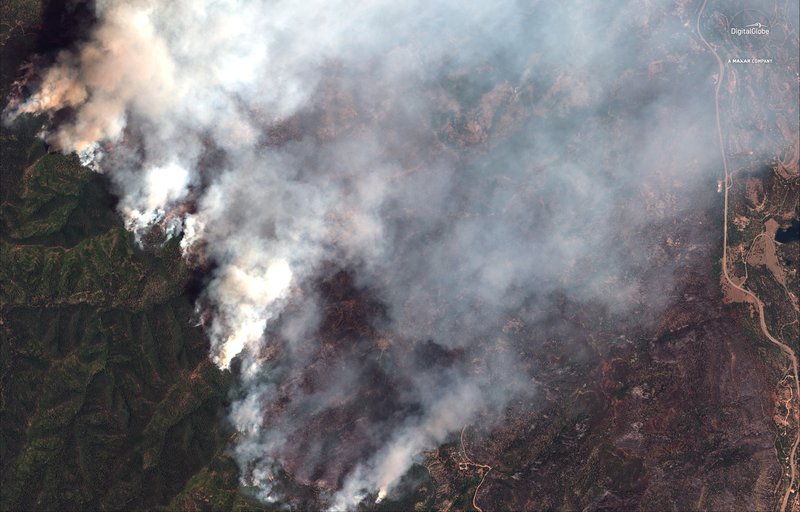 The Associated Press FIRES BY SATELLITE: This Sunday satellite image provide by DigitalGlobe shows the 416 Fire northwest of Hermosa, Colo. At right Highway 550 is visible.