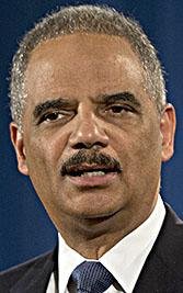  In this March 4, 2015, file photo, then-Attorney General Eric Holder speaks at the Justice Department in Washington. 