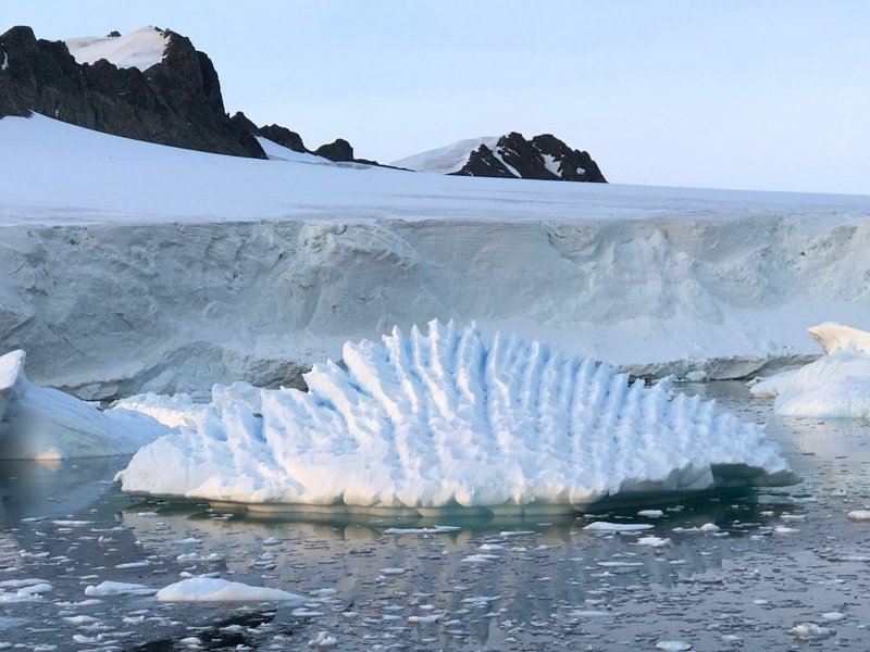 This January 2018 photo provided by researcher Andrew Shepherd shows an unusual iceberg near the Rothera Research Station on the Antarctic Peninsula. In a study released Wednesday, June 13, 2018, an international team of ice experts said the melting of Antarctica is accelerating at an alarming rate, with about 3 trillion tons of ice disappearing since 1992. (Andrew Shepherd/University of Leeds via AP)