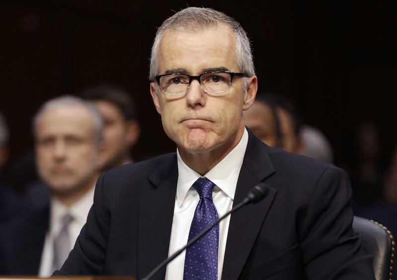 In this May 11, 2017, file photo then-acting FBI Director Andrew McCabe listens on Capitol Hill in Washington.  (AP Photo/Jacquelyn Martin, File)