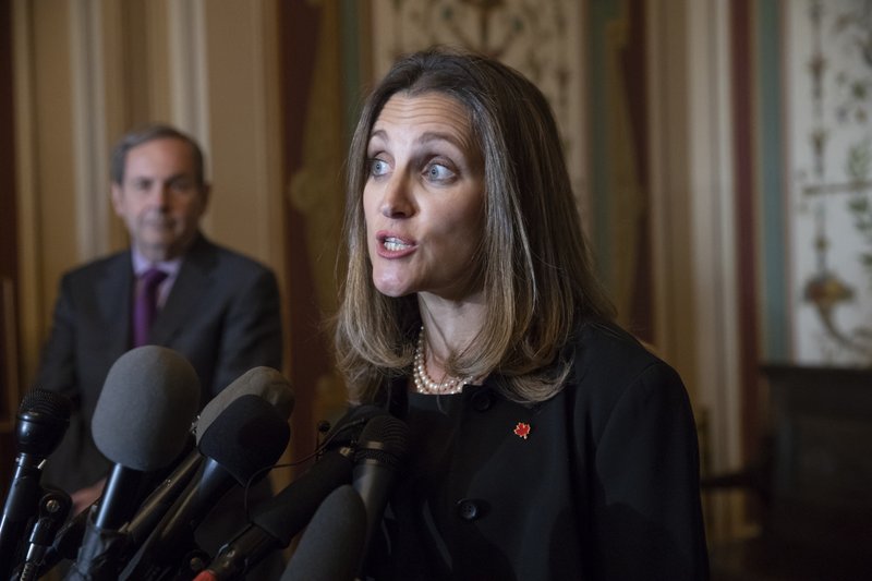 Canadian Minister of Foreign Affairs Chrystia Freeland speaks with reporters after meeting with the U.S. Senate Foreign Relations Committee at the Capitol in Washington, Wednesday, June 13, 2018. Freeland's visit comes after President Donald Trump insulted Canadian Prime Minister Justin Trudeau at the recent Group of Seven summit in Canada, calling him "dishonest" and "weak" after the prime minister spoke against American tariffs on steel and aluminum. (AP Photo/J. Scott Applewhite)