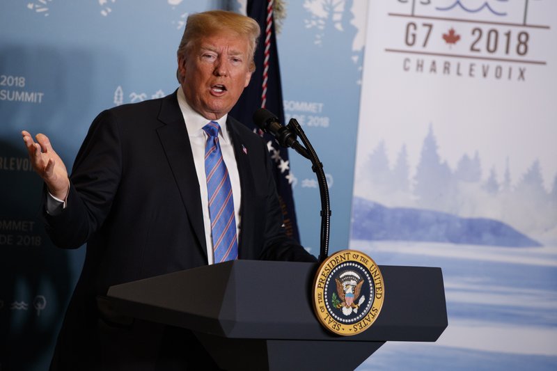 In this June 9, 2018 file photo, President Donald Trump speaks during a news conference at the G-7 summit in La Malbaie, Quebec, Canada. New York Attorney General sues the Trump Foundation, Thursday, June 14, saying it engaged in a pattern of illegal self-dealing. (AP Photo/Evan Vucci, File)