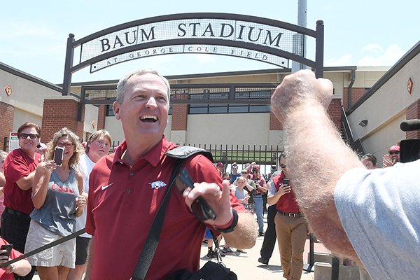 Head coach Dave Van Horn smiles as he departs for Omaha and the College World Series Thursday June 14, 2018 at Baum Stadium in Fayetteville. More than a hundred fans turned out to see the team as they departed. The Hogs are taking on Texas Sunday at 1 P.M.