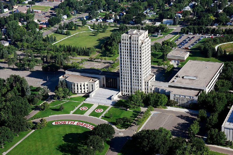 Bismarck’s statehouse complex is more than government office buildings; it’s also home to the North Dakota Heritage Center and State Museum and a park commemorating veterans.  North Dakota Tourism 
The United Tribes Technical College International Powwow takes place Sept. 7-9 this year.  