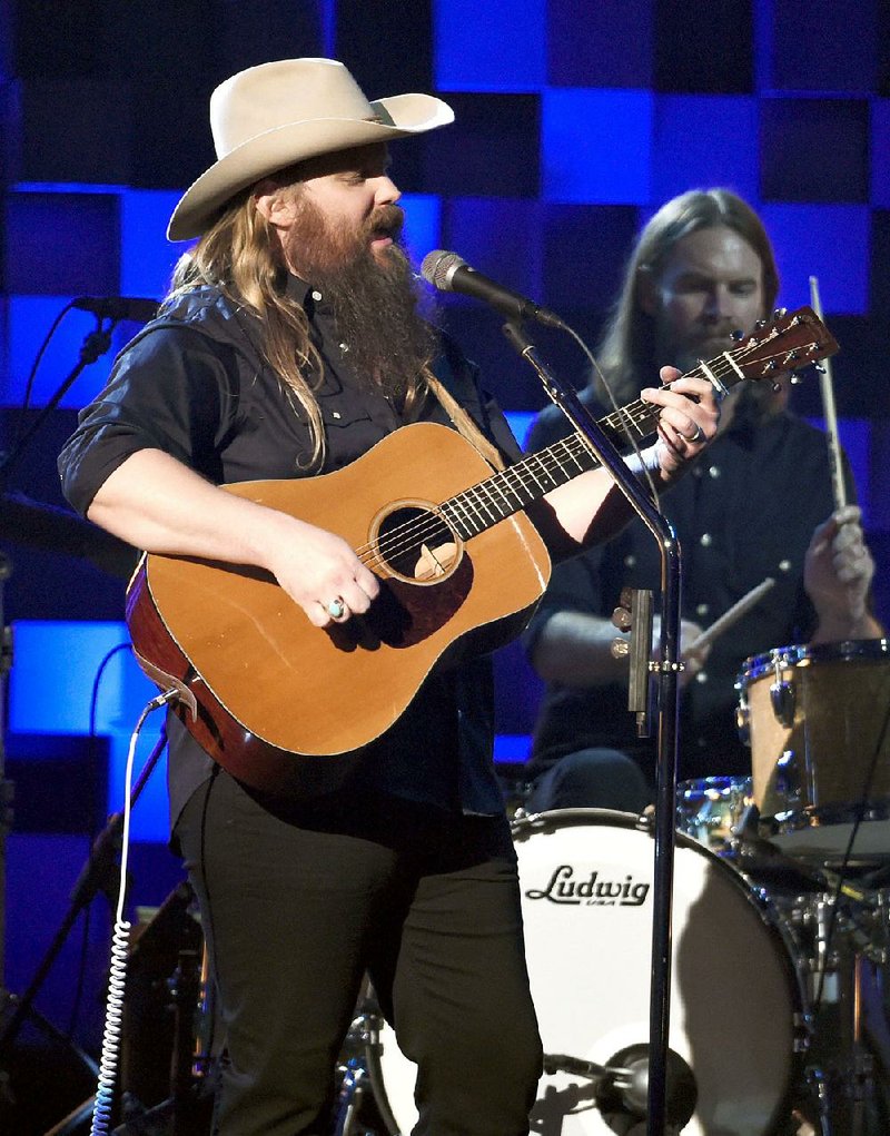 Chris Stapleton performs Friday at the Walmart AMP in Rogers. 