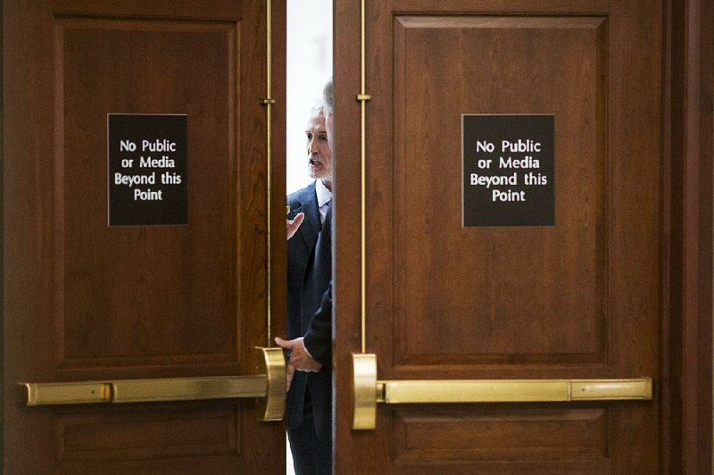 Rep. Trey Gowdy (left), R-S.C., chairman of the House Oversight Committee, talks with Rep. Mark Meadows, R-N.C., after a review of the inspector general’s report Thursday. 