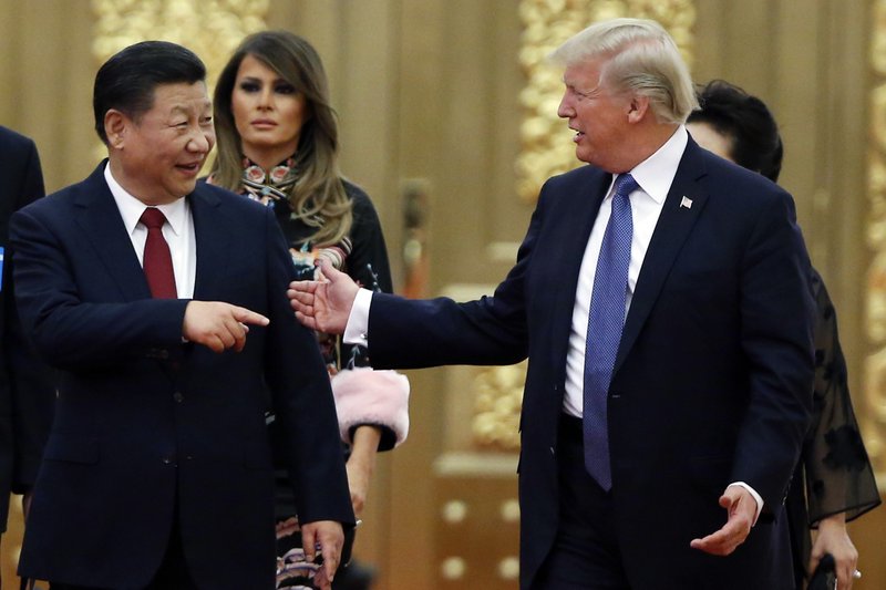 The Associated Press DIPLOMATIC DINNER: U.S. President Donald Trump and China's President Xi Jinping arrive for the state dinner with the first ladies at the Great Hall of the People in Beijing, China, Nov. 9, 2017. Trump is closing in on a decision to impose punishing tariffs on tens of billions of dollars of Chinese goods as early as June 15, a move that could put his trade policies on a collision course with his push to rid the Korean Peninsula of nuclear weapons. Trump has long vowed to fulfill his campaign pledge to clamp down on what he considers unfair Chinese trading practices. But his calls for about $50 billion in tariffs could complicate his efforts to maintain China's support in his negotiations with North Korea.