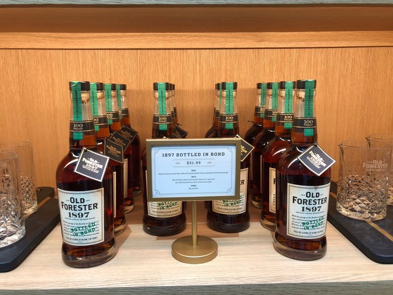 In this Thursday, June 7, 2018, photo, bottles of Kentucky straight bourbon whisky are displayed at Old Forester Distilling Co. in downtown Louisville, Ky. Old Forester, the bourbon that launched a family dynasty and a spirits company, has returned to its pre-Prohibition Kentucky home in a newly renovated building that symbolizes the brand's comeback. (AP Photo/Bruce Schreiner)