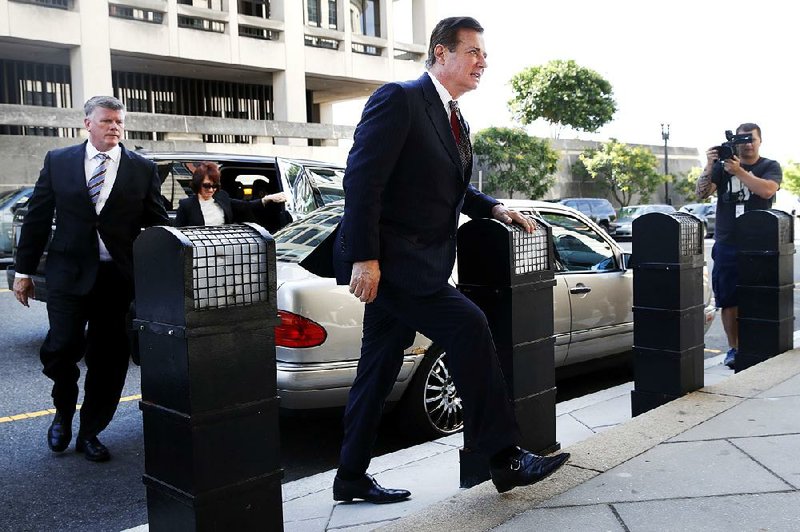 Paul Manafort, former chairman for Donald Trump’s presidential campaign, arrives at federal court Friday in Washington for a hearing in a case related to charges of conspiracy and money laundering. 