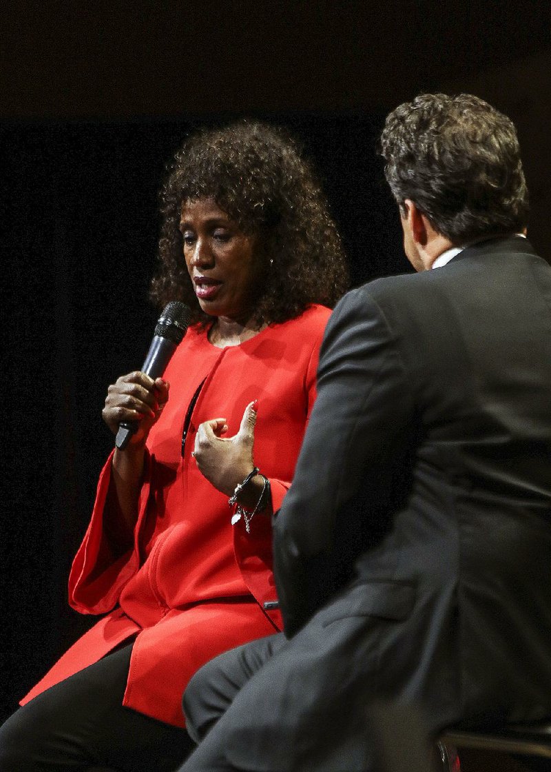 Jackie Joyner-Kersee answers questions from David Bazzel at the All-Arkansas Preps awards banquet Saturday night at the Statehouse Convention Center in Little Rock. 