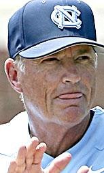 In this June 9, 2018, file photo, North Carolina coach Mike Fox encourages his players during an NCAA super regional college baseball game against Stetson, in Chapel Hill, N.C. 